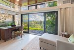 One of the most welcoming features in the master suite is the cozy seating alcove that features large wrap around windows which provide lots of warm, natural lighting, as well as expansive ocean and Molokai views